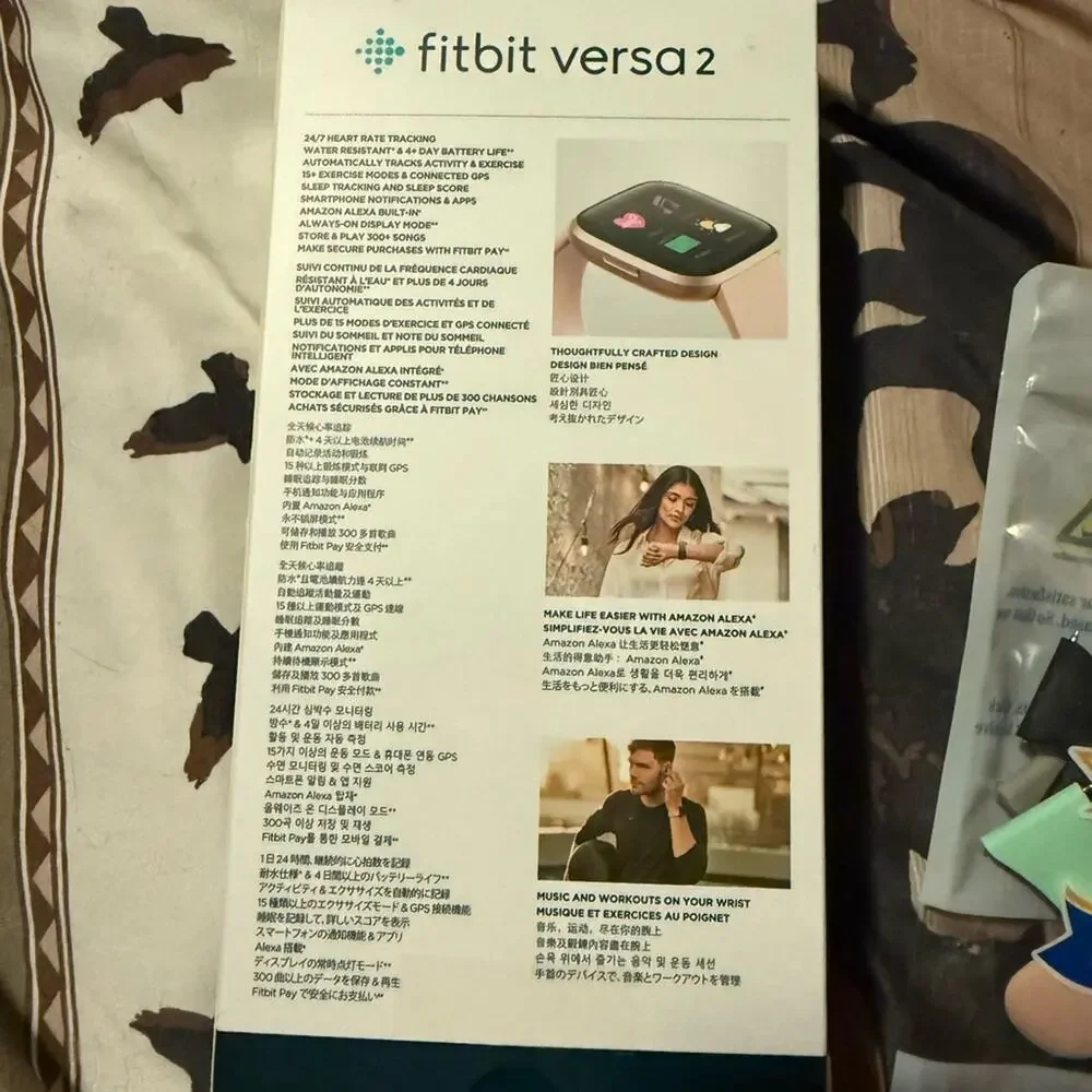 Pair of Fitbit Versa and Fitbit Versa 2, 2 chargers, 2 screen protectors, bands